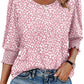 Avslappet bluse for kvinner med 3/4-ermer og smockmansjetter