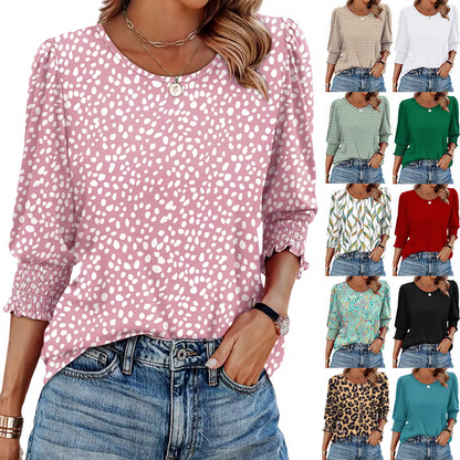 Avslappet bluse for kvinner med 3/4-ermer og smockmansjetter