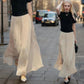 Glanset is silke gulvlang, bredbent culottes