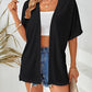 Elegant løs kortermet cardigan