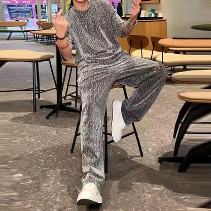 2-delt sett for herre med kortermet overdel og vide bukser