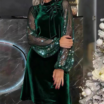 Kjole til dame med paljetter og sløyfe i halsen