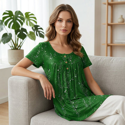 Plissert tunika for dame med blomsterprint