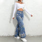 Damejeans med Blomsterprint og Rette Ben