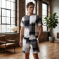 Sett for herre: t-skjorte og shorts med abstrakt trykk