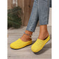 Pustende strikkede slip-on mules for kvinner