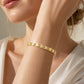 Elegant hjerte-leddarmbånd for kvinner