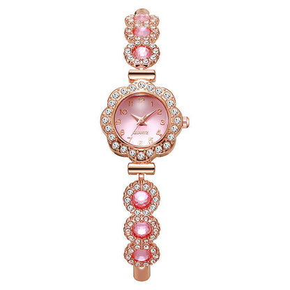 🔥50% RABATT på utvalgte produkter 🎉🌸💎✨Eleganter kvinnelig ur med blomsterkrans og rhinestones